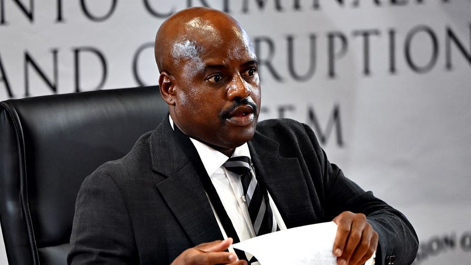 South African ex-police chief gets tissue stuck on forehead while sweating during corruption inquiry Schools Australia